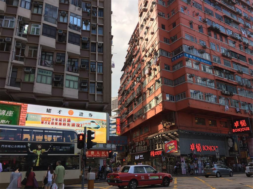 Mingdu Hostel Цзюлун Экстерьер фото
