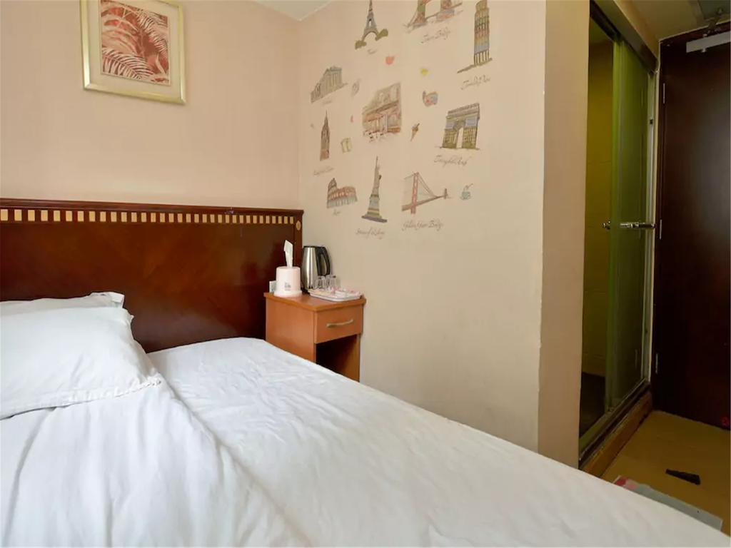 Mingdu Hostel Цзюлун Экстерьер фото