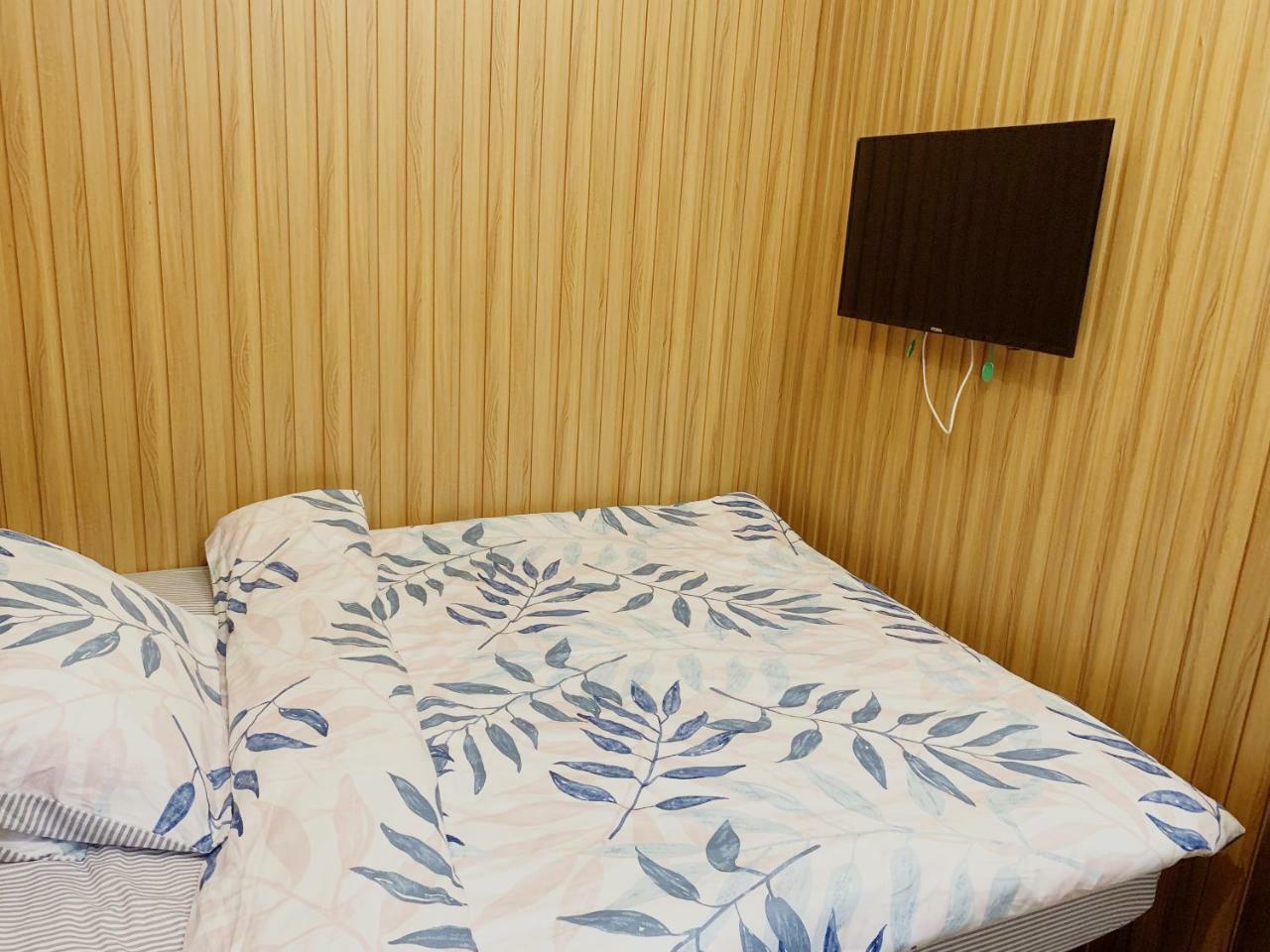 Mingdu Hostel Цзюлун Экстерьер фото
